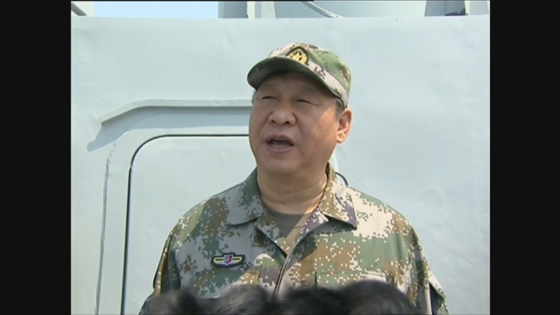 South China Sea: Xi Jinping attends massive naval display