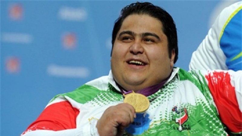 Iranpress: Iranian powerlifter breaks new records in Asian Para Games