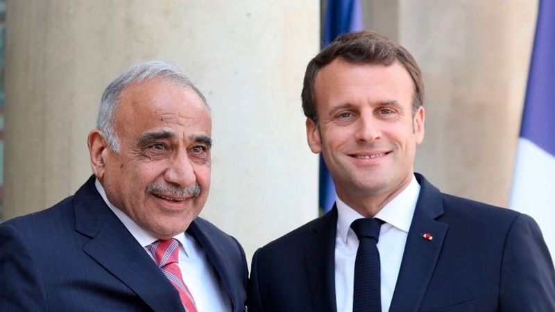 Iranpress: Iraqi PM and French President discuss Daesh threat