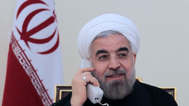 Iranpress: Rouhani stresses on developing relations with Doha