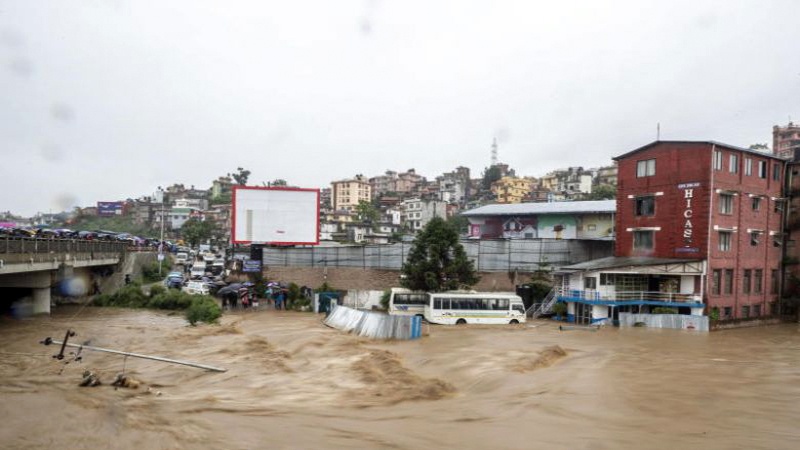 Iranpress: Floods, landslides and monsoon rains take the lives of at at least 40 in South Asia 