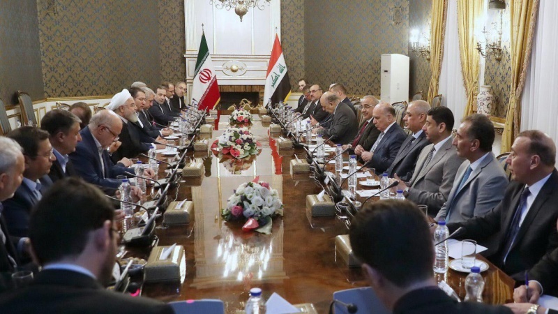 Iranpress: Rouhani: Mutual visits contributes to development of Iran-Iraq relations 
