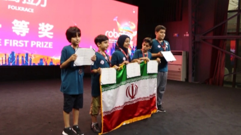 Iranpress: Iranian students win three championship titles in Robotex Asia 2019