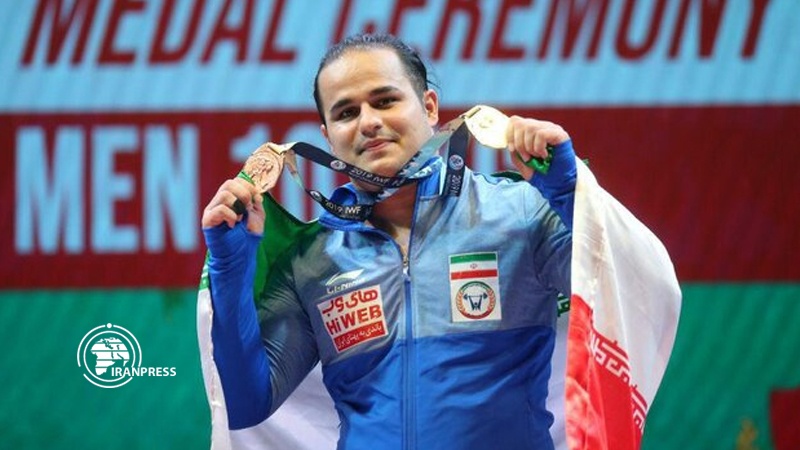 Iranpress: Iranian Weightlifter wins gold