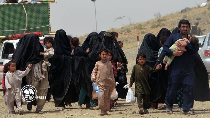 Iranpress: More than 350,000 Afghans displaced in 2019: UN report
