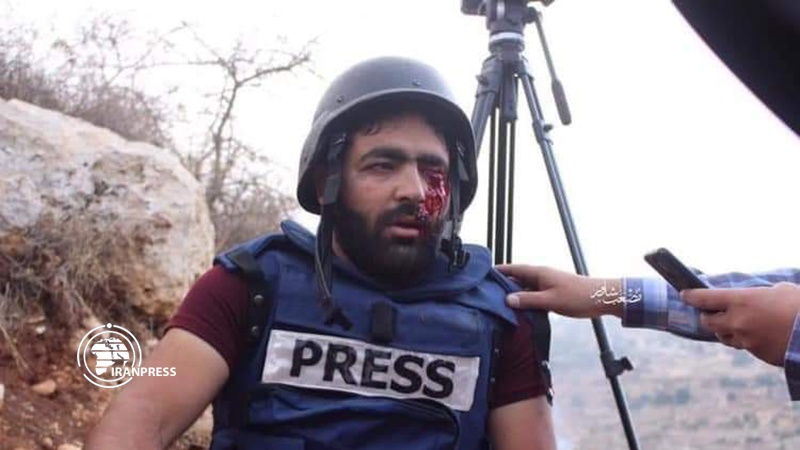 Iranpress: Palestinian photojournalist looses sight of one eye by Israeli military