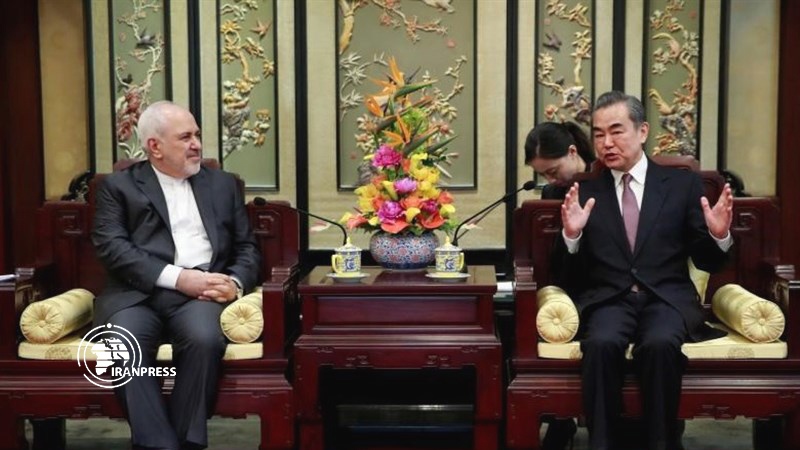 Iranpress: Zarif meets his Chinese counterpart in Beijing