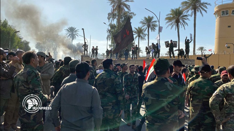Iranpress: Iraqi protesters enter the US embassy compound in Baghdad