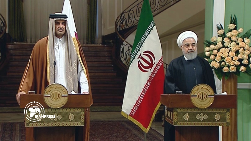 Iranpress: President Rouhani and Sheikh Tamim hold joint Press conference