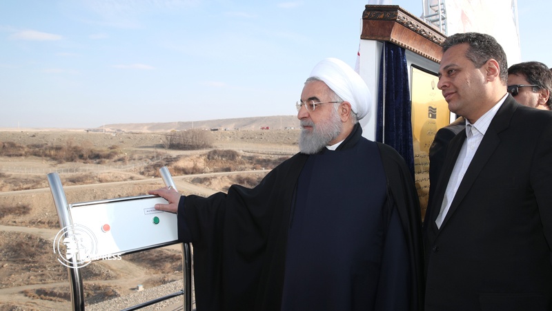Iranpress: President Rouhani opens Ahmad Beyglu Dam Project 