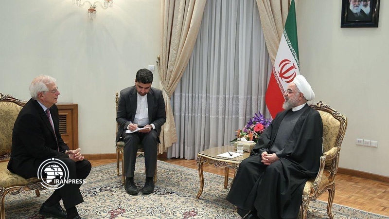 Iranpress: Iran reduces JCPOA commitments to save the deal: Rouhani tells Borrell 