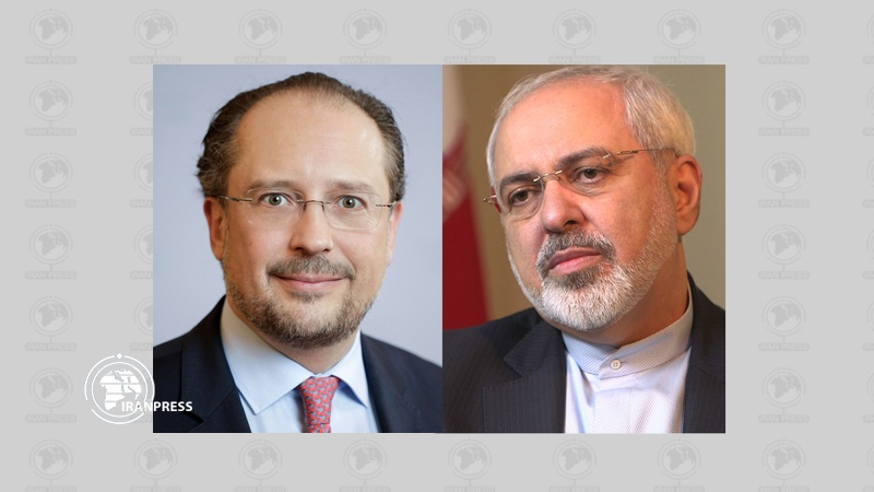 Iranpress: Iran’s FM discusses coronavirus with his Austrian counterpart