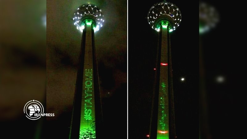 Iranpress: Milad Tower goes green to honor medical staff amid COVID-19 pandemic