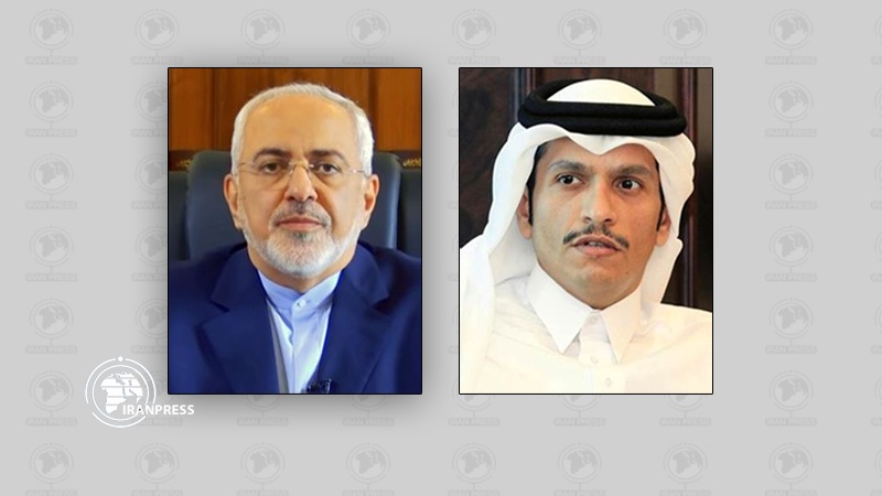 Iranpress: Zarif discusses Afghan political situation with Qatari counterpart