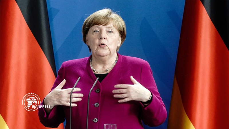 Iranpress: Merkel: COVID-19 pandemic will be overcome sooner if world cooperates