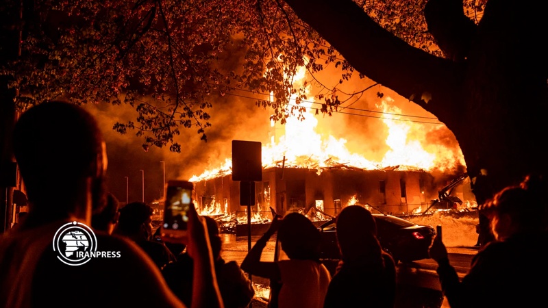 Iranpress: Building burns as riots erupt in US Minneapolis