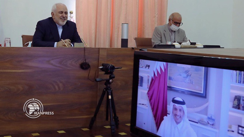 Iranpress: Iranian, Qatari FMs confer on bilateral cooperation