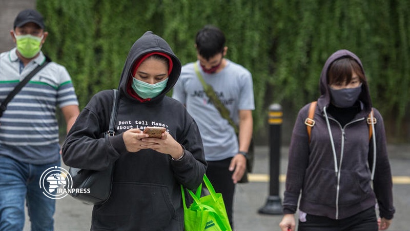 Iranpress: WHO calls on nations to encourage wearing face masks
