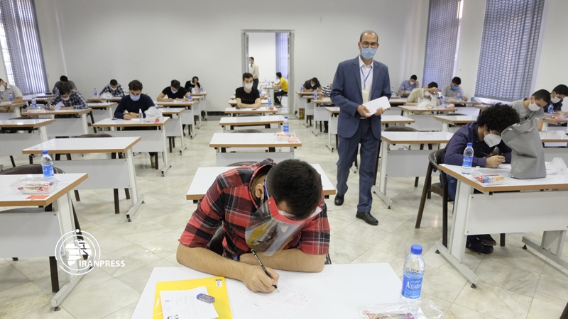 Iranpress: Iran holds university entrance exams, observing health protocols