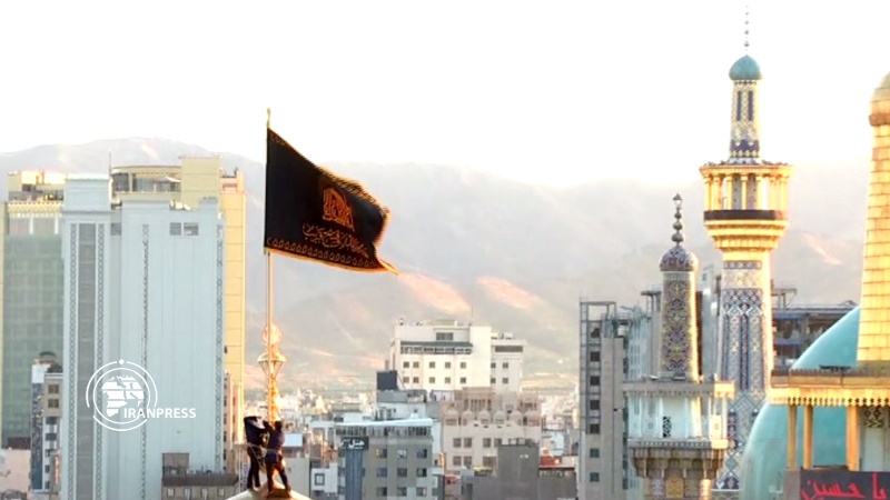 Iranpress: Start of Muharram rituals at Imam Reza holy shrine by changing flag