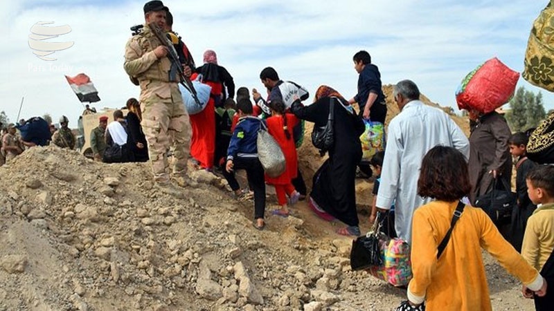 Iranpress: خوشحالی آوارگان عراقی از بازگشت به منازل خود 