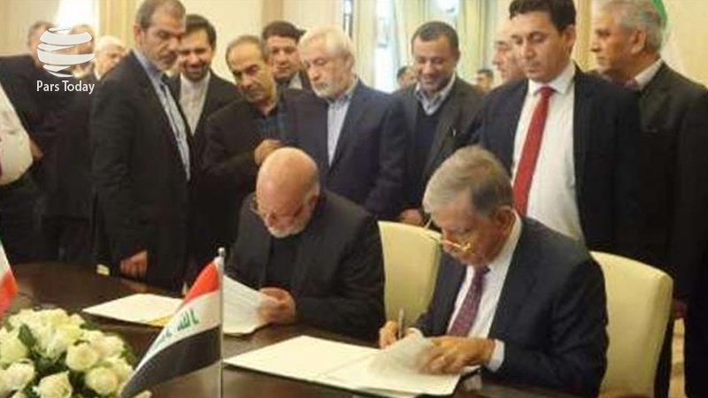 Iranpress: ایران و عراق یادداشت تفاهم همکاری نفتی امضا کردند 
