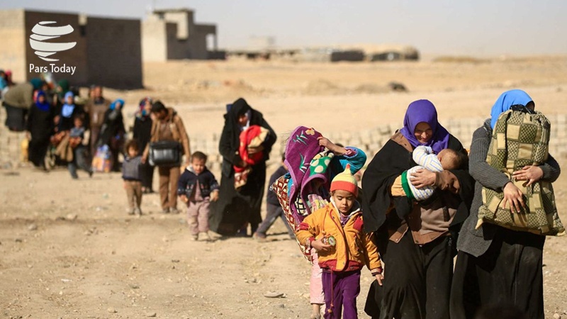 Iranpress: تداوم خروج ساکنان غرب موصل از مناطق تحت اشغال گروه تروریستی داعش + ویدئو