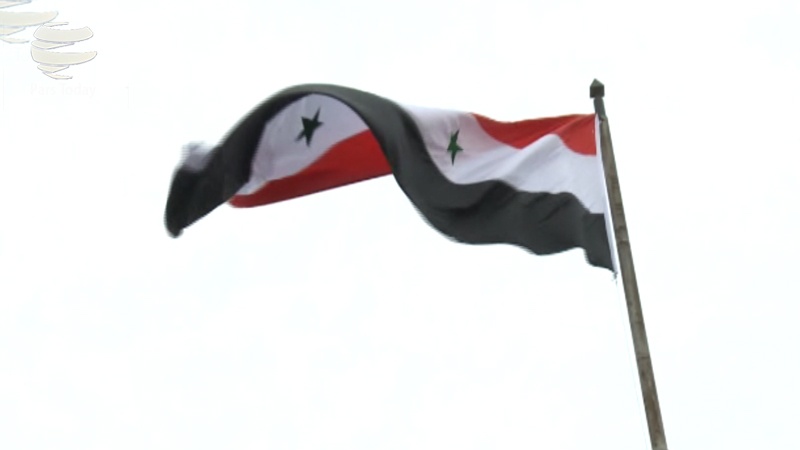 Iranpress: گزارش: اهتزاز پرچم سوریه بر پایانه مرزی نصیب بعد از سه سال