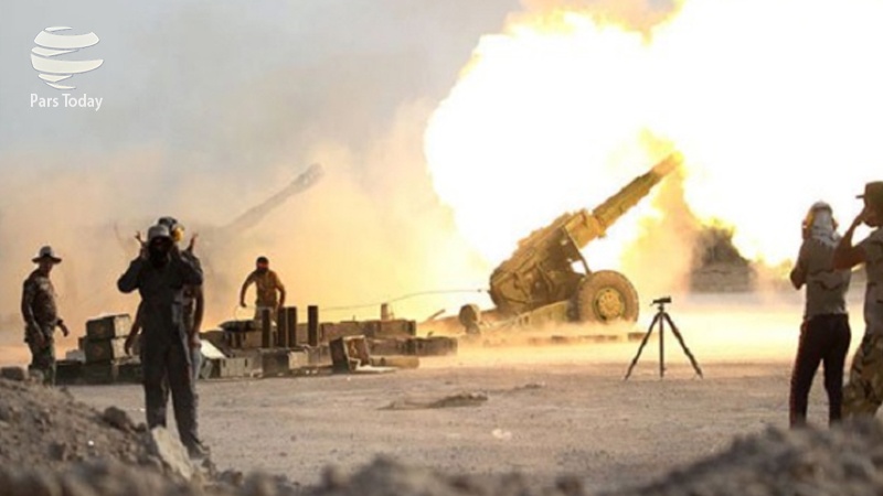 Iranpress: حمله الحشدالشعبی عراق به مواضع داعش در مرز سوریه