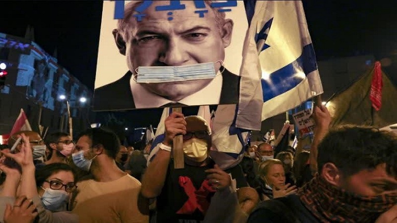 Iranpress:  سرزمین‌های اشغالی امروز هم صحنه اعتراضات علیه نتانیاهو است
