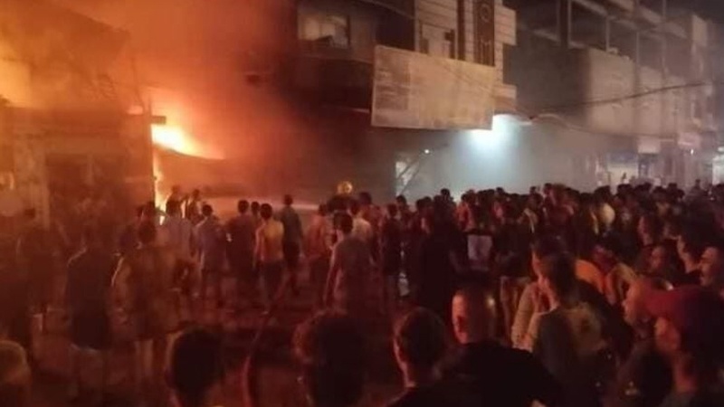 Iranpress: ۱۰ مفقود درپی آتش سوزی در مرکز بغداد